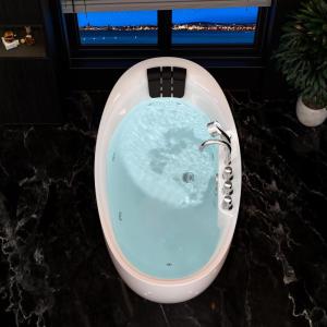 imageEmpava 71 Inch Freestanding Whirlpool Tub  Stand Alone Jetted Bathtub with Recline Angle Boat Shape Hydromassage AcrylicETL Certified