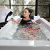 imageEmpava Acrylic Whirlpool Bathtub 71Inch Jetted Bathtub with Healing Chromotherapy Heated Soaking Tub with LED Control Panel Comforting Hydro Massage Tub with Waterfall Joy Black Pillow71JT351BK